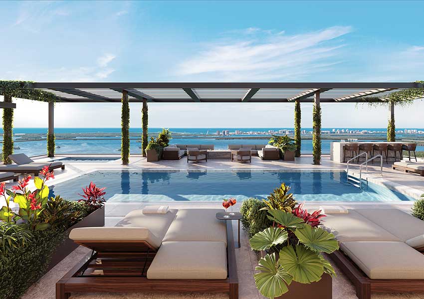 Island West bay rooftop pool Rooftop pool and lounge at Island West Bay with panoramic views of Estero Bay and coastal skyline